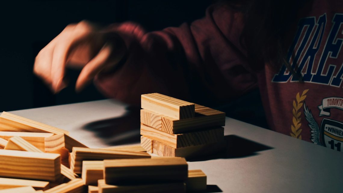 brown wooden blocks on white table